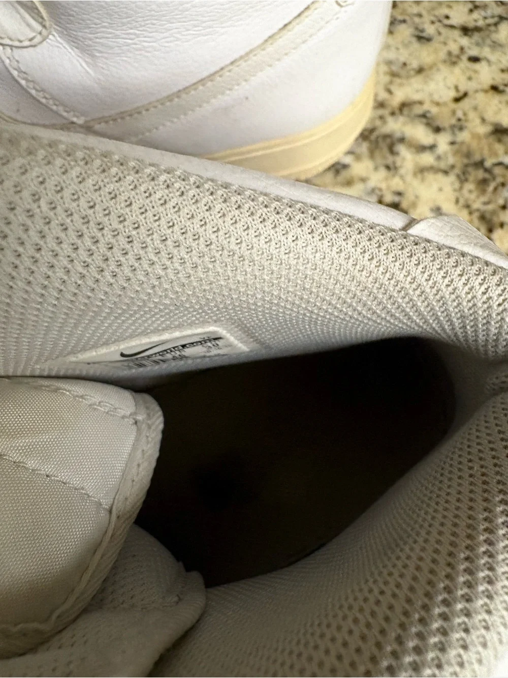 Nike White High-Top Sneakers with Cream Sole
